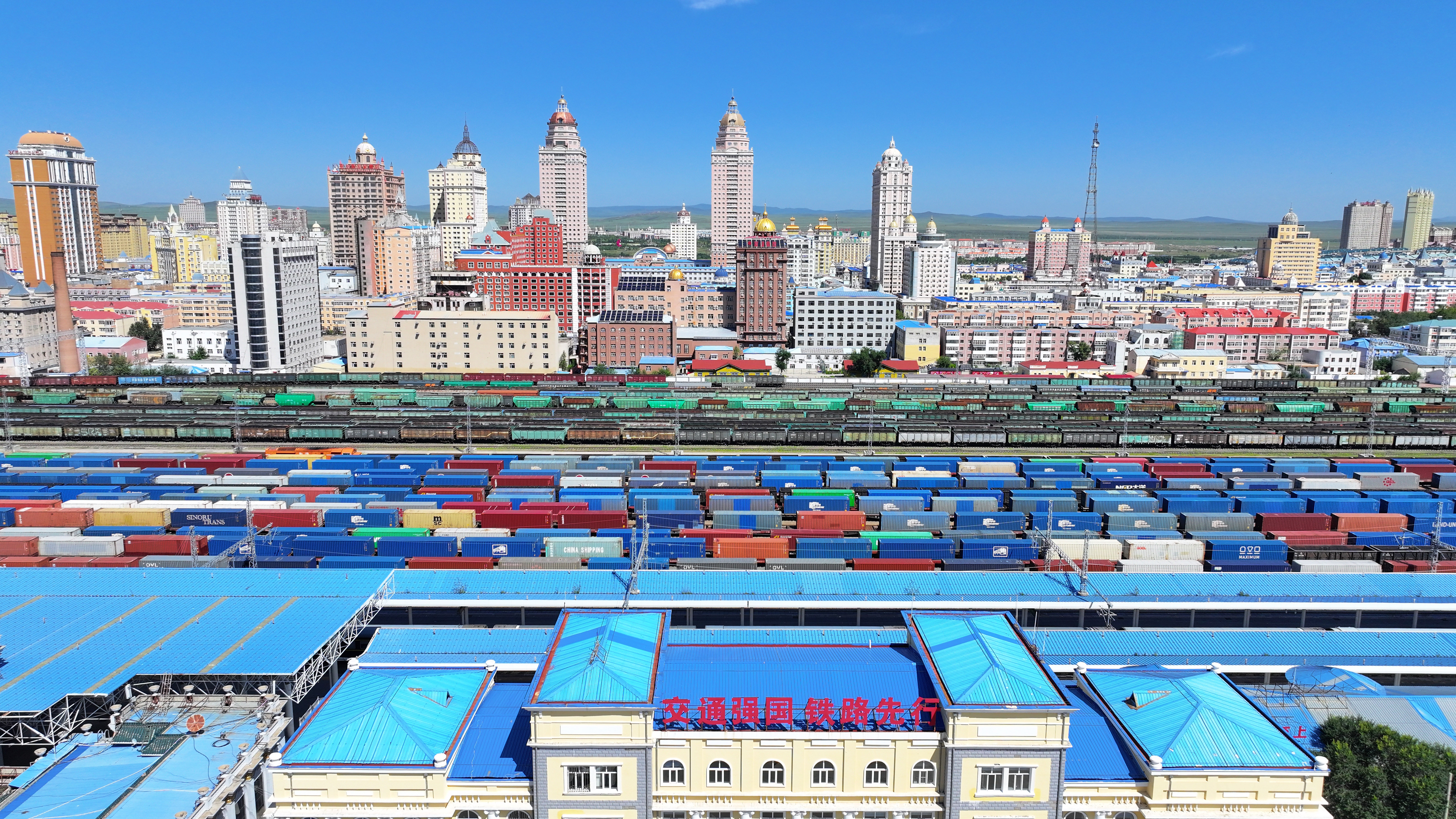 An aerial drone photo shows trains for China-Europe freight service at Manzhouli Railway Port in north China's Inner Mongolia Autonomous Region